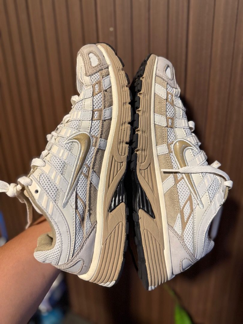 Nike V2K Run Sail Metallic Gold (Category: Sneakers) located in Molave. Submitted by thrifttashoe (Listing ID 1466879693, Image 2). Description: - Model: Nike V2K Run - Colorway: Sail and Metallic Gold - Size: US 9 / UK 8 - Style: Chunky retro runner with mesh panels and suede overlays - Features: Super comfortable midsole with durable black rubber outsole - Condition: Very clean with minimal wear on uppers and soles - Perfect for: Trendy daily b