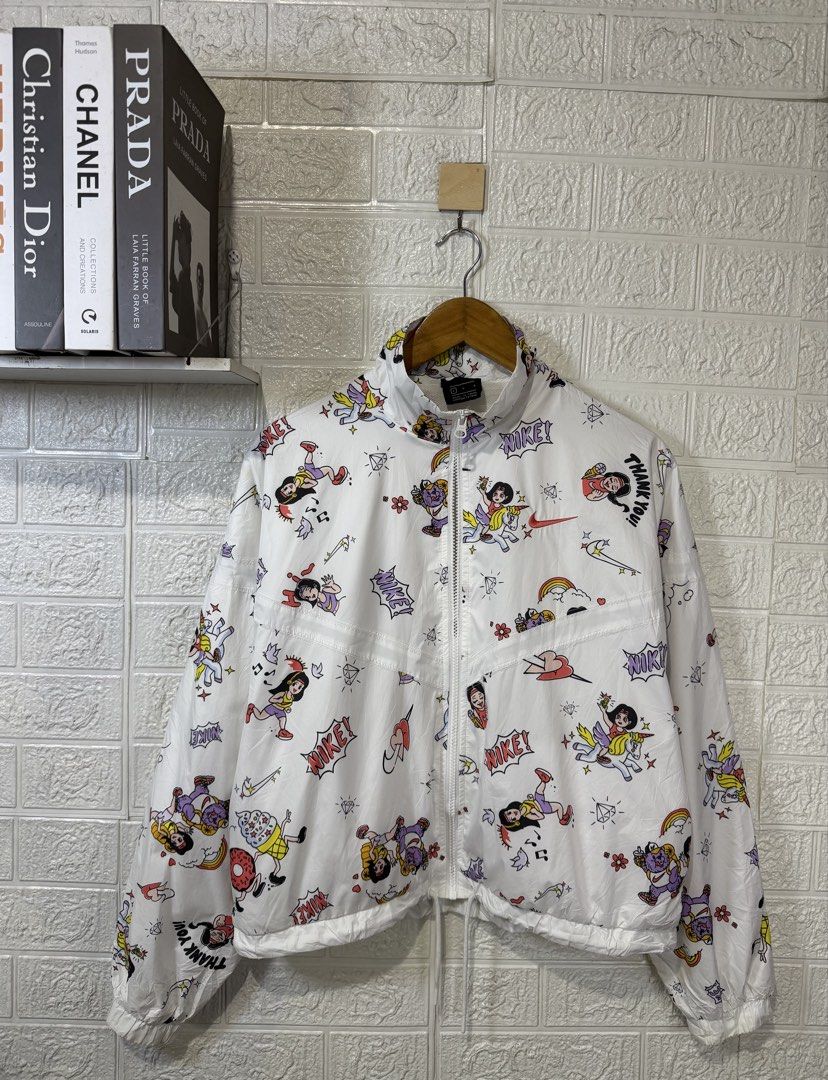 NIKE ZIP UP ALL OVER GRAPHIC DESIGN WINDBREAKER JACKET (Category: Coats, Jackets and Outerwear) located in Baguio. Submitted by kds_stuffs (Listing ID 1466794672, Image 1). Description: Mine: 450 📍N1K3 zip-up all over graphic design windbreaker jacket 😍 Size: Medium Dimension: 22L x 22W Color rate: 9/10 Issue: hirap lang ifull zip Very good condition Need wash Gandara neto 💗.