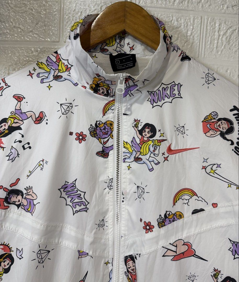 NIKE ZIP UP ALL OVER GRAPHIC DESIGN WINDBREAKER JACKET (Category: Coats, Jackets and Outerwear) located in Baguio. Submitted by kds_stuffs (Listing ID 1466794672, Image 3). Description: Mine: 450 📍N1K3 zip-up all over graphic design windbreaker jacket 😍 Size: Medium Dimension: 22L x 22W Color rate: 9/10 Issue: hirap lang ifull zip Very good condition Need wash Gandara neto 💗.