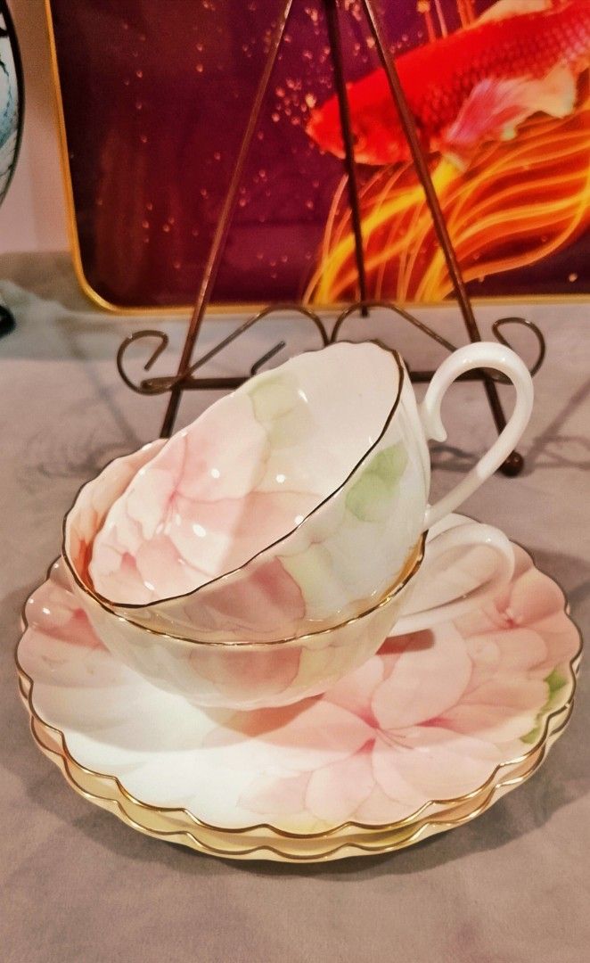 Nikko Pastel teacup sets (Category: Coffee & Tea Tableware) located in Cabanatuan. Submitted by miss.maia (Listing ID 1466962150, Image 3). Description: Brand: Nikko (Japan) Material: Fine Bone China Design: Pastel pink floral motif with scalloped edges and gold-trimmed rims 680 take all +sf.