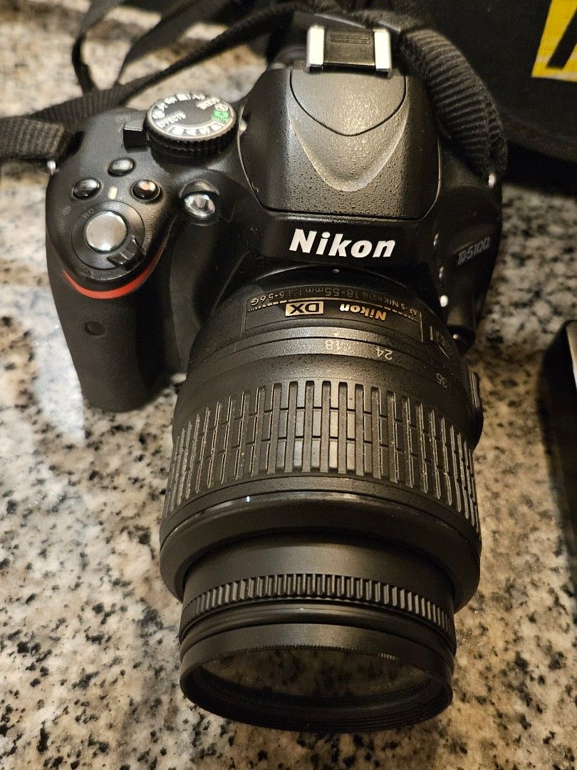 Nikon DSLR Camera with Lens and Bag (Category: Cameras) located in Manila. Submitted by gcprime (Listing ID 1466778341, Image 3). Description: Nikon DSLR camera setup, ready to shoot right away. Includes Nikkor 18-55 lens, 16.2 megapixel crop sensor, battery and charger, 3-inch flip-out screen. Everything packs neatly into the Nikon branded carrying bag with shoulder strap. Fully functional, screen powers on clearly. Great kit for photography beg