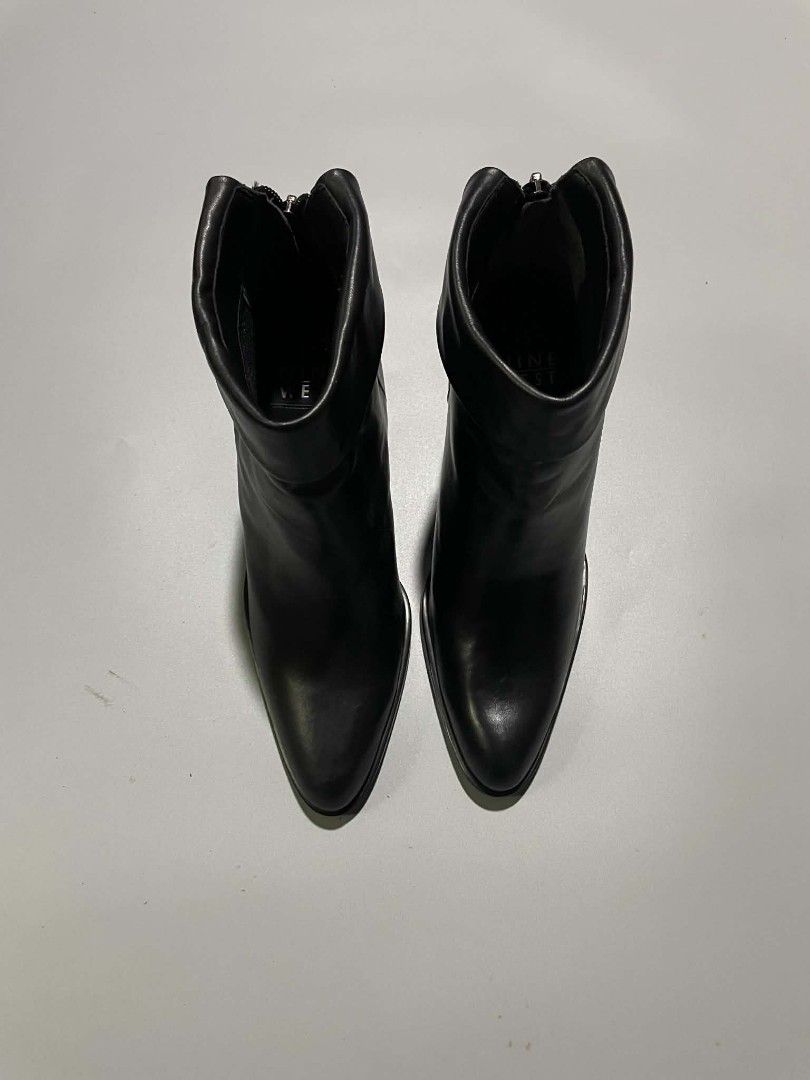 Nine West Black Boots (Category: Boots) located in Cavite. Submitted by imgnr0 (Listing ID 1466845037, Image 2). Description: good condition check details pic size 38 message for more details .