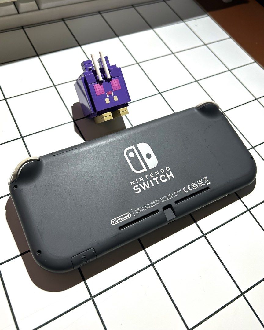 Nintendo Switch Lite Grey | jailbroken (Category: Nintendo) located in Manila. Submitted by quincy.67 (Listing ID 1466885109, Image 3). Description: Rush selling jailbroken Nintendo switch lite grey colorway!! Need funds for tuition, help a student out^^ No issues aside from slight scratch on right joycon but doesn’t affect gameplay whatsoever. All buttons working, no stick drift and touch screen no issue. With 128 gb sandisk card with games inst