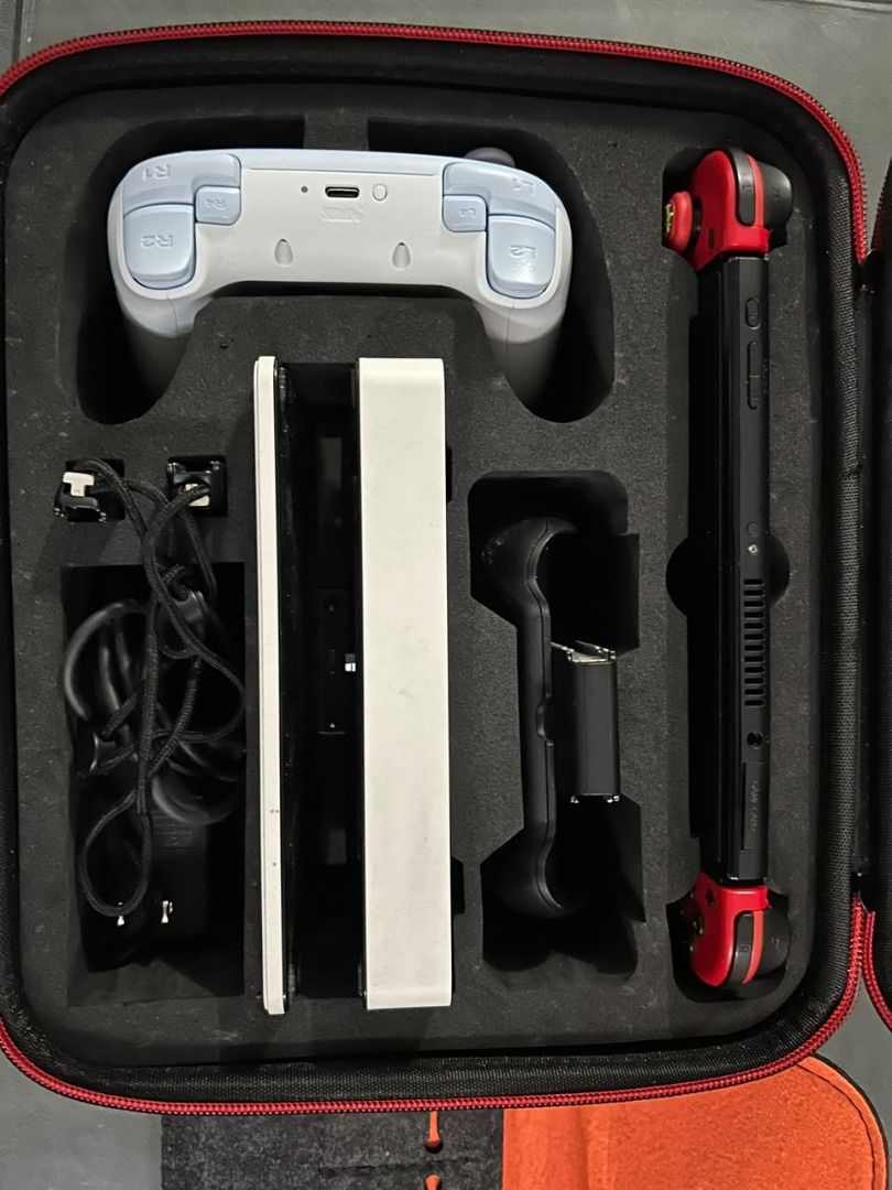 Nintendo Switch OLED Model Console Bundle with Games and Accessories (Category: Nintendo) located in Cavite. Submitted by mightyfalcon_f832f3 (Listing ID 1466969764, Image 3). Description: All in good condition✨ Inclusion: ✅8bitDo controller with own charger cable ✅Nintendo Switch Joy-Con comfort grip ✅Nintendo Switch OLED Model TV Dock ✅Nintendo Switch Joy-Con wrist straps ✅Nintendo Switch Leg Strap ✅Nintendo switch charger ✅felt pouch with Card