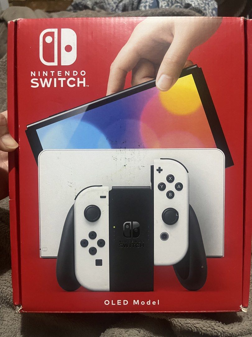 Nintendo Switch OLED Model White (Category: Nintendo) located in Pasig City. Submitted by dexter010283 (Listing ID 1466925274, Image 2). Description: - Brand new Nintendo Switch OLED (White Model) - Includes original box and white Joy-Con controllers - Console and controllers are still factory sealed in plastic - 100% unused and ready for initial setup - Perfect for gifts or personal upgrade.