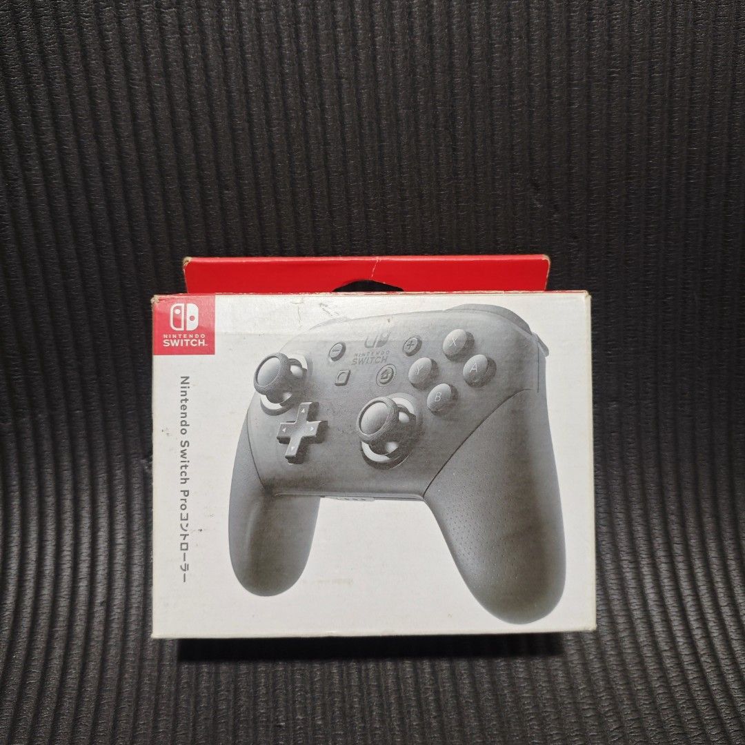 Nintendo Switch Pro Controller (Category: Controllers) located in Quezon City. Submitted by shopme_gadget30 (Listing ID 1466926643, Image 1). Description: kindly read the details first for sale fixed price Good Condition tested and working no drifting all buttons working with box and charging cord compatible to Nintendo switch v1/v2/ or oled ,pc android Original with bag and charging cord qc area meet up: sm north shipping fee must shoulder by th