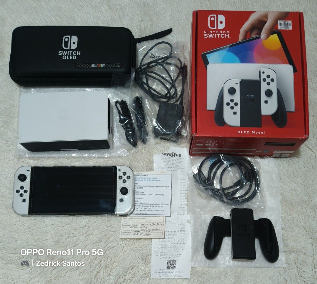 NS OLED & LITE (Category: Nintendo) located in Manila. Submitted by zedricksantos (Listing ID 1466874033, Image 1). Description: FOR SALE ‼️ 🎮 Nintendo Switch Oled White & Lite Turquoise w/ Warranty 🎮 OLED WHITE 06/07/26 dop, under warranty 'til June 2027 w/ official receipt from Toys R Us & Service Warranty Card Complete accessories Transaparent Case Pouch Tempered Glass Installed Since Day 1 No Issue LITE TURQUOISE 09/14/26 dop, under warrant