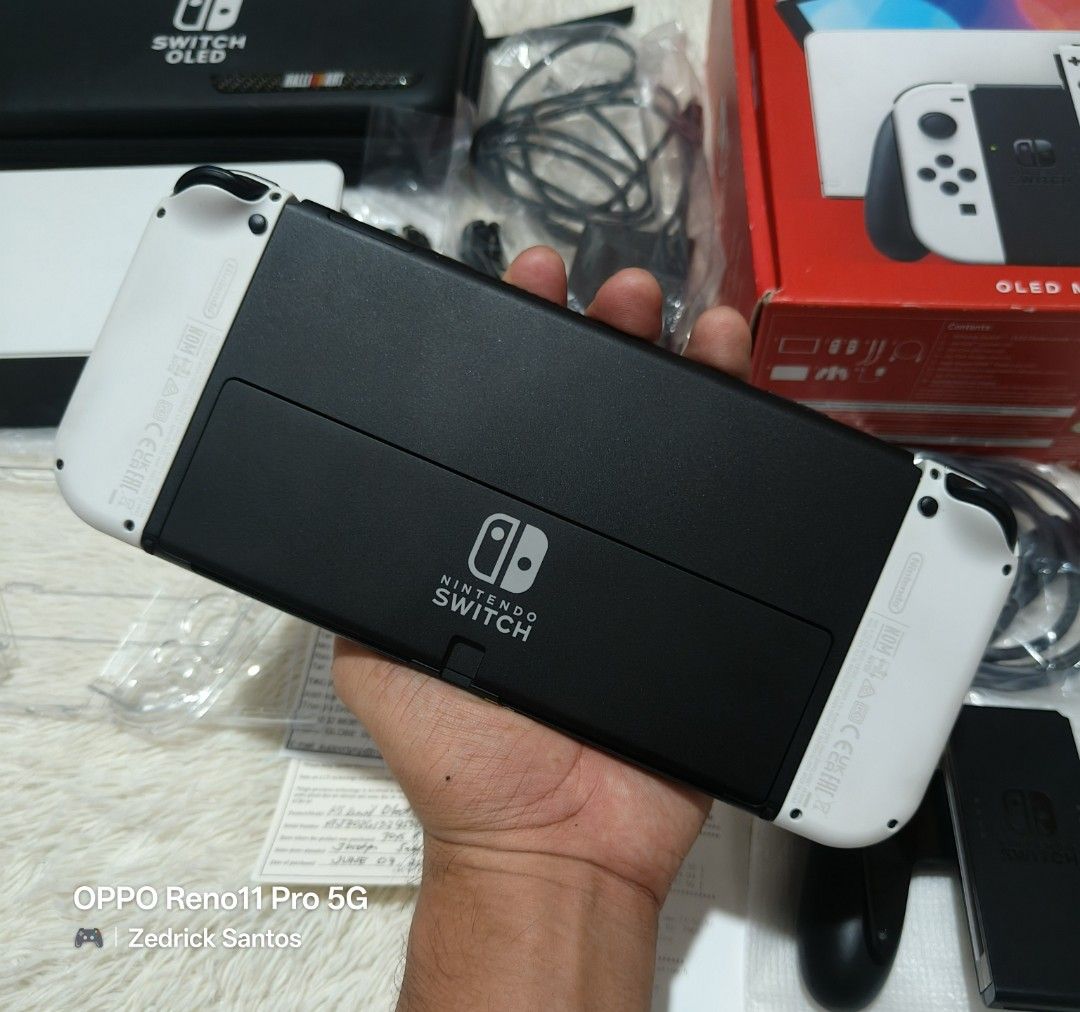 NS OLED & LITE (Category: Nintendo) located in Manila. Submitted by zedricksantos (Listing ID 1466874033, Image 2). Description: FOR SALE ‼️ 🎮 Nintendo Switch Oled White & Lite Turquoise w/ Warranty 🎮 OLED WHITE 06/07/26 dop, under warranty 'til June 2027 w/ official receipt from Toys R Us & Service Warranty Card Complete accessories Transaparent Case Pouch Tempered Glass Installed Since Day 1 No Issue LITE TURQUOISE 09/14/26 dop, under warrant