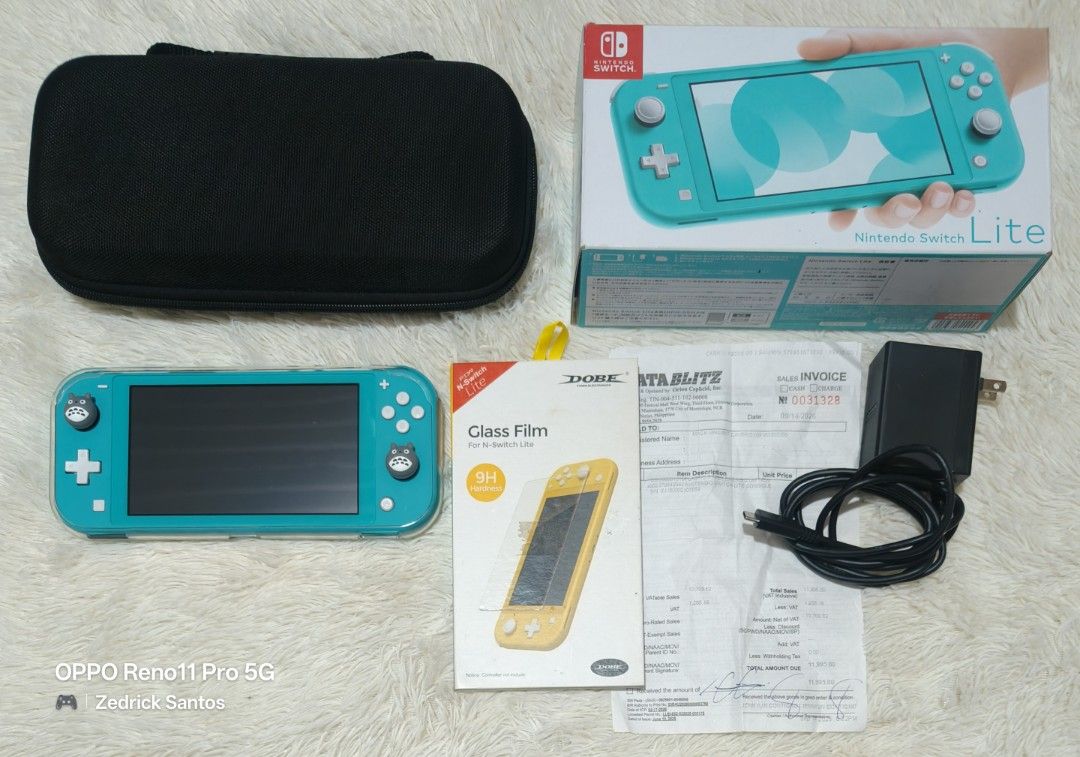 NS OLED & LITE (Category: Nintendo) located in Manila. Submitted by zedricksantos (Listing ID 1466874033, Image 3). Description: FOR SALE ‼️ 🎮 Nintendo Switch Oled White & Lite Turquoise w/ Warranty 🎮 OLED WHITE 06/07/26 dop, under warranty 'til June 2027 w/ official receipt from Toys R Us & Service Warranty Card Complete accessories Transaparent Case Pouch Tempered Glass Installed Since Day 1 No Issue LITE TURQUOISE 09/14/26 dop, under warrant