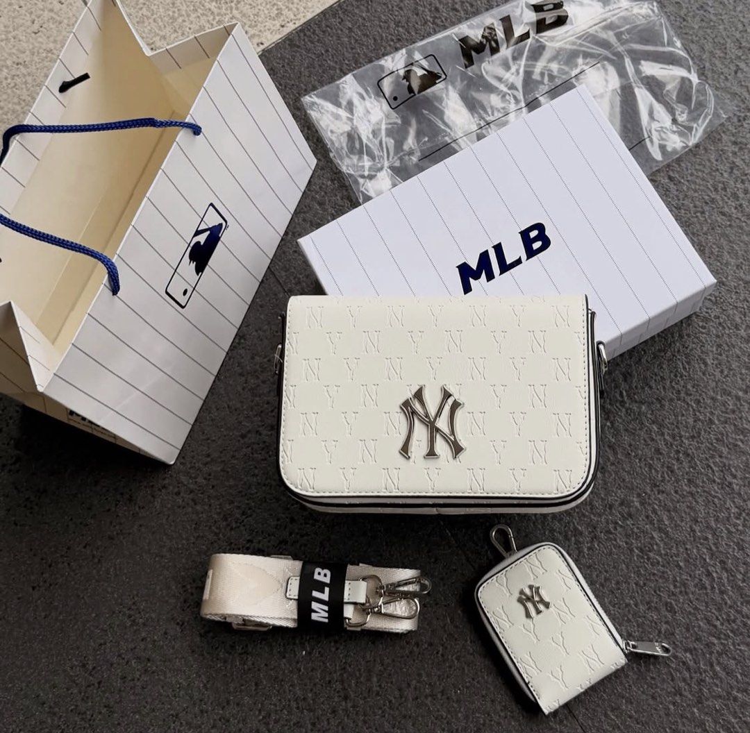 NY MLB SLING BAG (Category: Sling Bags) located in Manila. Submitted by hotlinebling_co. (Listing ID 1466903469, Image 1). Description: NY MLB Mońoğram Sling bag Comes with Sling coin purse, MLB KOREA HARD BOX With hangtags Adjustable strap Inner pocket Inner 1zip SALE‼️.