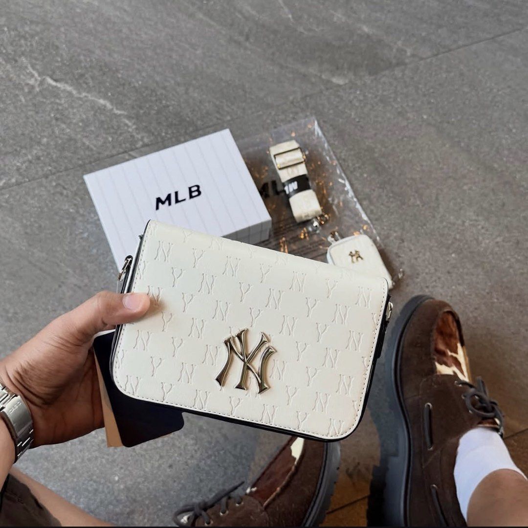 NY MLB SLING BAG (Category: Sling Bags) located in Manila. Submitted by hotlinebling_co. (Listing ID 1466903469, Image 3). Description: NY MLB Mońoğram Sling bag Comes with Sling coin purse, MLB KOREA HARD BOX With hangtags Adjustable strap Inner pocket Inner 1zip SALE‼️.