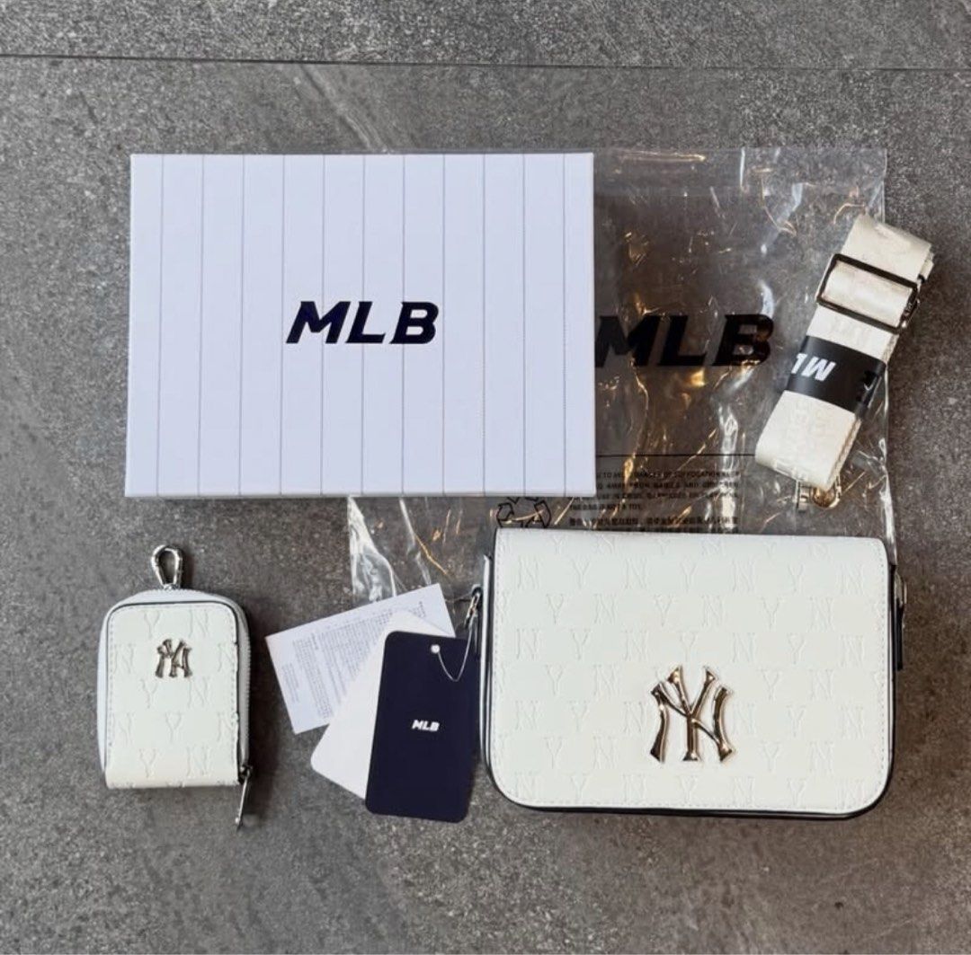 NY MLB SLING BAG (Category: Sling Bags) located in Manila. Submitted by hotlinebling_co. (Listing ID 1466903469, Image 2). Description: NY MLB Mońoğram Sling bag Comes with Sling coin purse, MLB KOREA HARD BOX With hangtags Adjustable strap Inner pocket Inner 1zip SALE‼️.