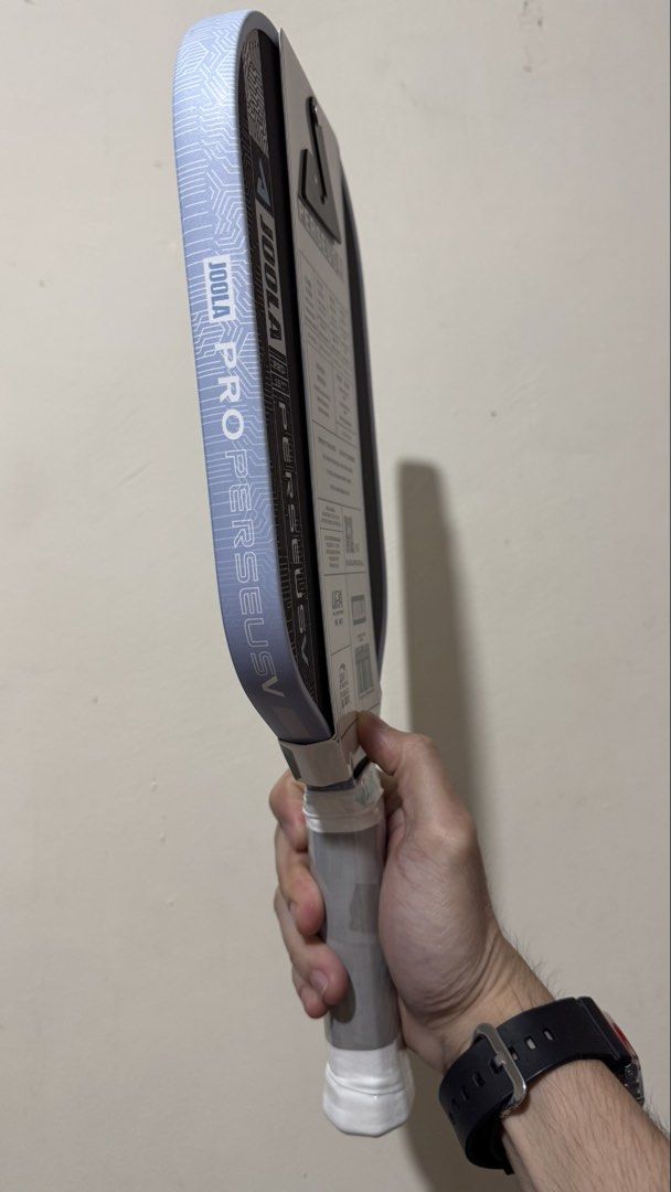 OEM JOOLA Pro Perseus 16mm Pickleball Paddle (Category: Racket and Ball Sports) located in Bacoor. Submitted by miel888 (Listing ID 1466861372, Image 3). Description: - Brand: JOOLA - Model: Pro Perseus 16mm Pickleball Paddle - Condition: Brand new, unused in original cardboard packaging - Details: Handle protective wrap intact, standard grip size, iconic logo on bottom cap - Performance: High-performance paddle designed for serious players.