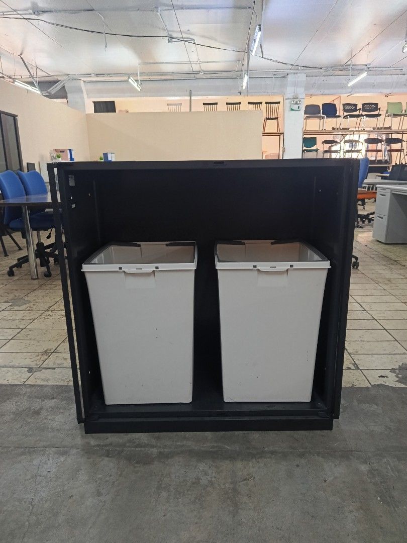 OfficeBusters Black Dual Bin Storage Cabinet (Category: Shelves, Cabinets & Racks) located in Quezon City. Submitted by kevinmacabata12997160 (Listing ID 1466779709, Image 3). Description: - Brand: OfficeBusters dual bin storage cabinet in sleek black - Dimensions: 90 cm (L) x 45 cm (W) x 95 cm (H) - Features: Double doors with convenient top slot openings for easy disposal or access - Storage: Includes 2 removable inner bins - Material: Sturdy m