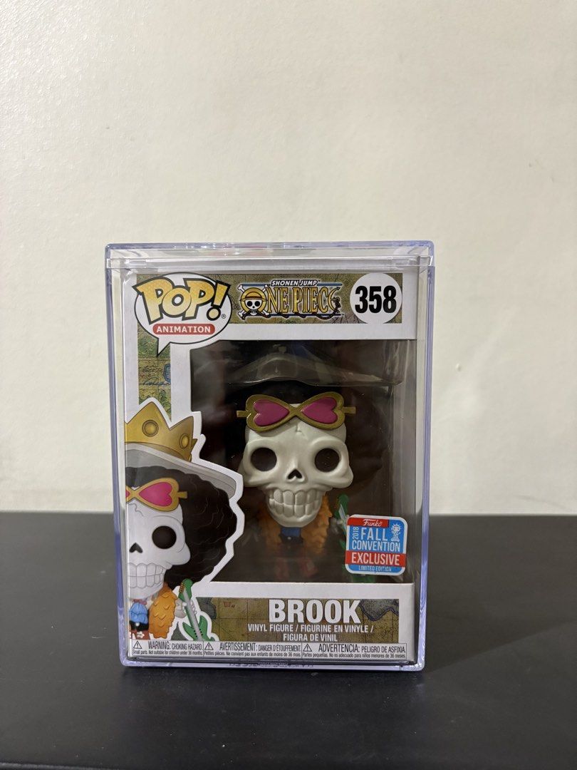 OG Brook Funko Pop (Category: Designer & Blind Box Toys) located in Guagua. Submitted by pop.vault (Listing ID 1466826502, Image 1). Description: - Item: Funko Pop Animation #358 - Brook (One Piece) - Edition: 2018 Fall Convention Exclusive (with convention sticker) - Condition: Great box corners, stored inside a clear plastic protective case - Perfect addition to any One Piece collection.