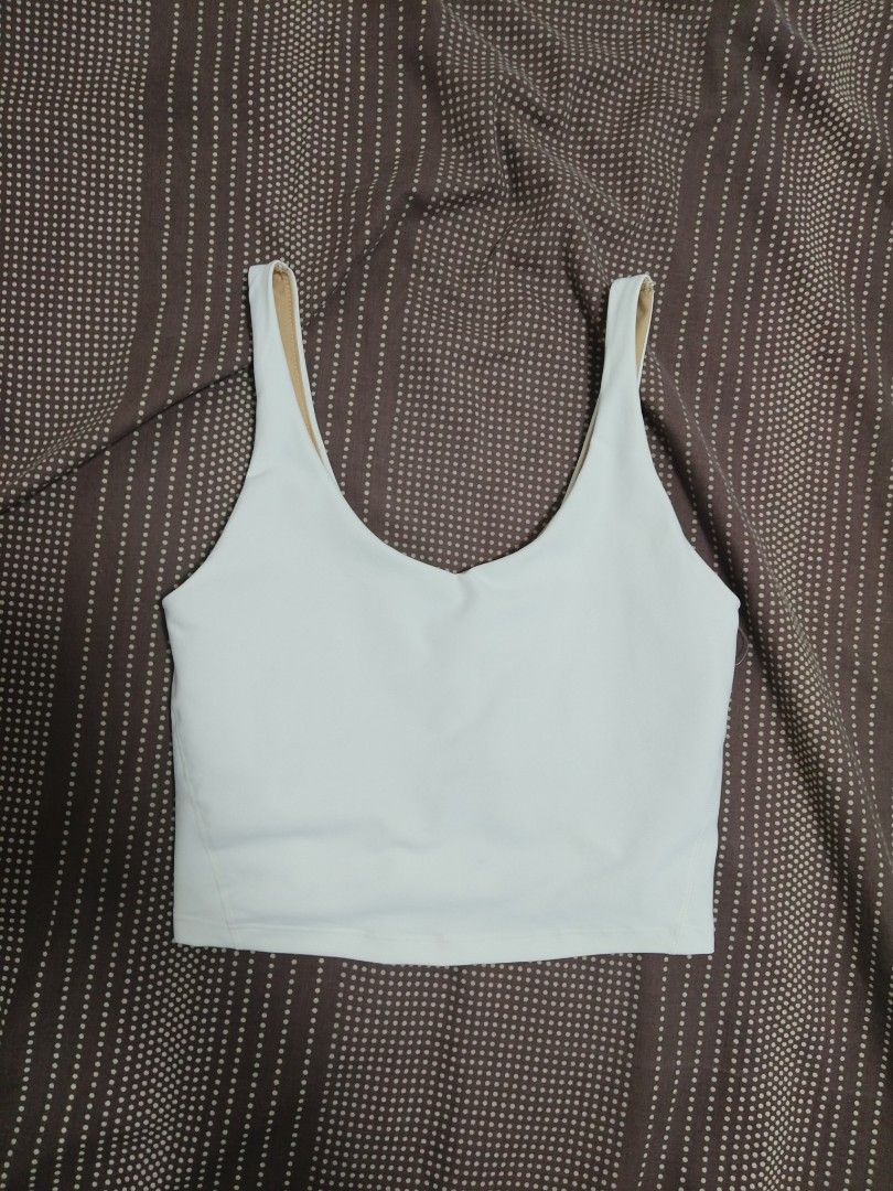 Old Navy Active Powersoft Light Support Crop Bra Medium (Category: Activewear) located in Manila. Submitted by arvi_ (Listing ID 1466843646, Image 1). Description: - Brand: Old Navy Active - Style: Powersoft crop sports bra with beige and white layered design - Size: M - Support: Light support with removable bra pads - Technology: Go-Dry moisture-wicking fabric - Material: 77% polyester, 23% spandex - Condition: Perfect for workouts or everyday c