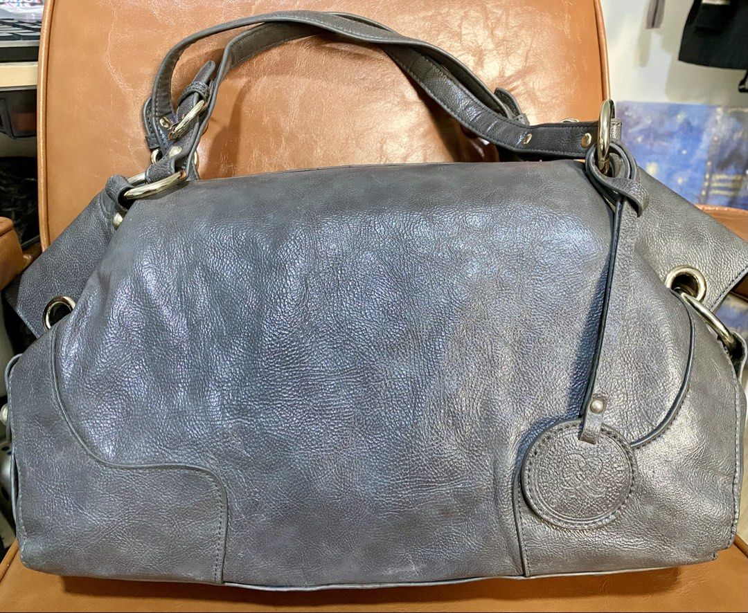 Authentic Olivia Lauren Leather Bag (Category: Tote Bags) located in Pasig City. Submitted by talaversify (Listing ID 1466882331, Image 2). Description: Brand: Authentic Olivia Lauren Shoulder Bag in excellent condition. Material: 💯 Genuine Leather Color: Charcoal Gray/Slate Hardware: Polished Silver-Tone (Rings, Buckles, and Stud Accents) .