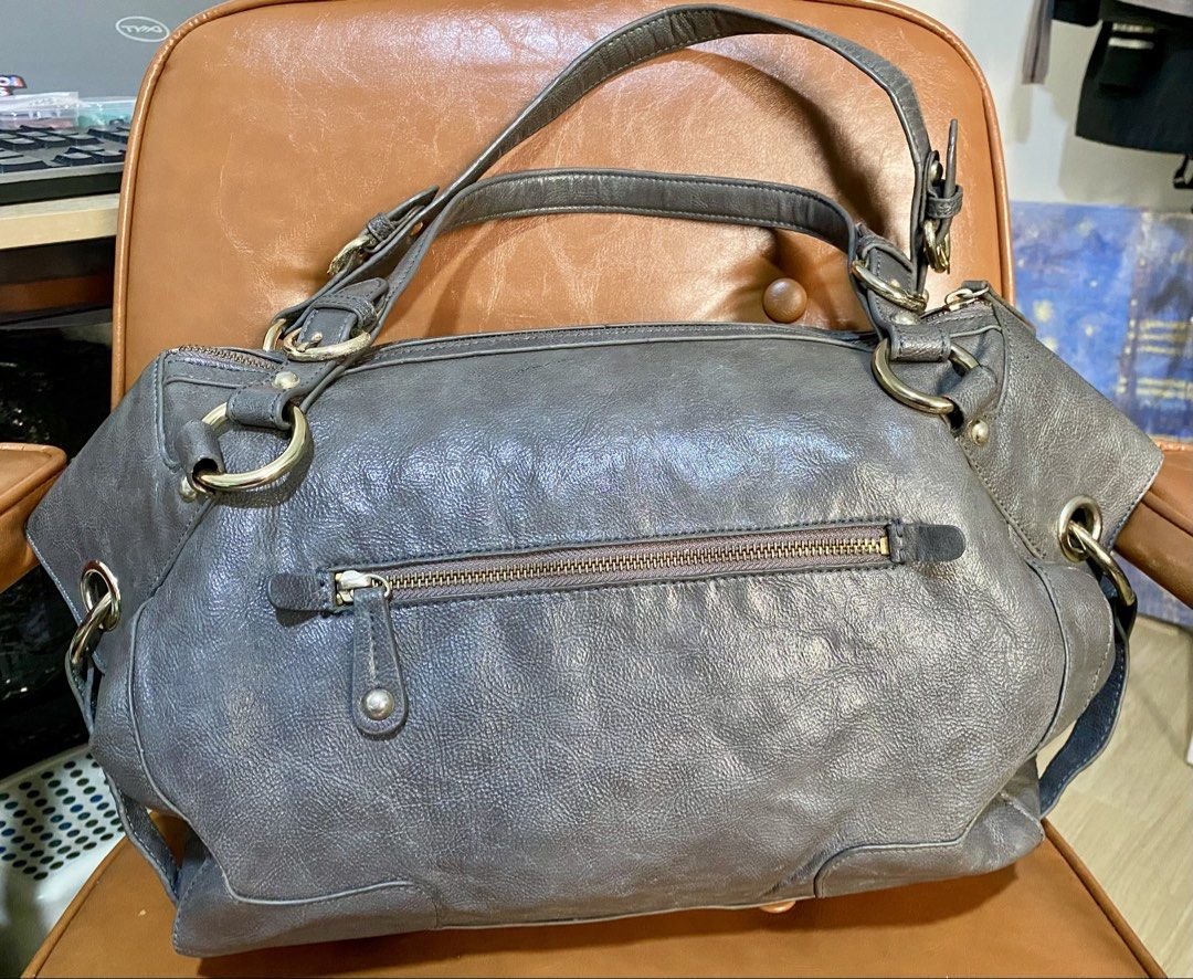 Authentic Olivia Lauren Leather Bag (Category: Tote Bags) located in Pasig City. Submitted by talaversify (Listing ID 1466882331, Image 3). Description: Brand: Authentic Olivia Lauren Shoulder Bag in excellent condition. Material: 💯 Genuine Leather Color: Charcoal Gray/Slate Hardware: Polished Silver-Tone (Rings, Buckles, and Stud Accents) .