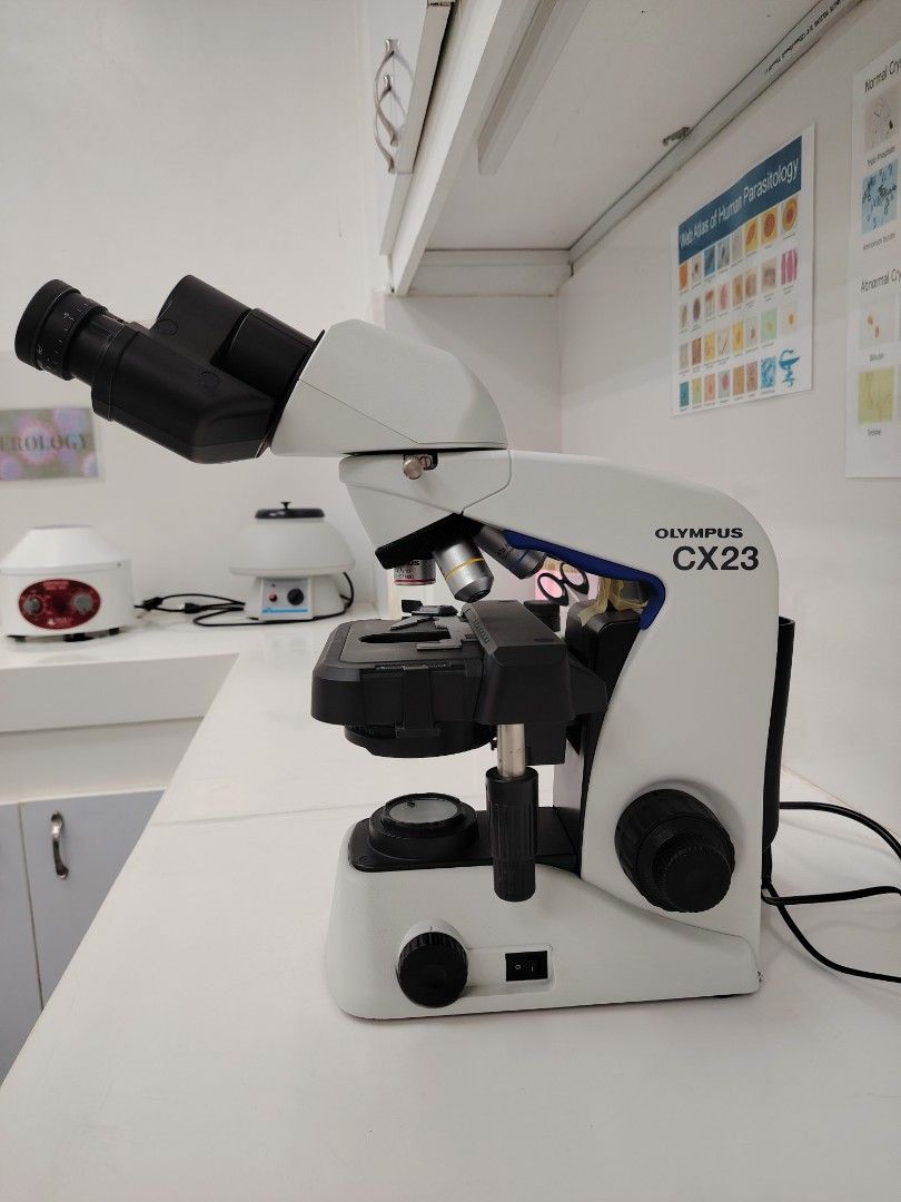 Olympus CX23 Laboratory Microscope (Category: Medical Supplies & Tools) located in Muntinlupa City. Submitted by zenalie_06 (Listing ID 1466808611, Image 1). Description: - Model: Olympus CX23 Binocular Microscope - Condition: Excellent working order, clean white housing - Setup: Standard laboratory configuration with mechanical stage, focus knobs, and objective lenses - Power: Tested and fully functional - Reason for selling: Lab closure - Deliv