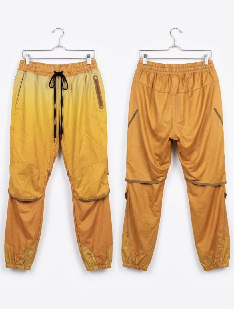 On x Loewe Running Pants (Category: Joggers) located in Caloocan City. Submitted by safewind.d918ef (Listing ID 1466924031, Image 1). Description: On x Loewe running pants in yellow and brown ombre tone. Women size large. Swiss engineering. Elastic waistband with adjustable black drawstring. Zip pocket on the side. Unique panel design and layered details down the legs. Fabric tags and interior branding clearly attached. Great athletic piece with 