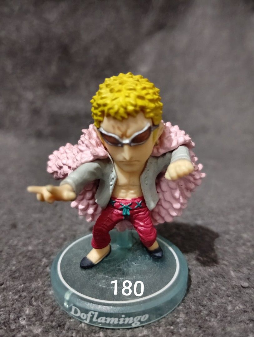 One Piece Donquixote Doflamingo Chibi Mini Figures (Category: Figurines & Statues) located in Quezon City. Submitted by johnoppais84003 (Listing ID 1466881114, Image 3). Description: Donquixote Doflamingo chibi figures from One Piece - Includes various dynamic poses: open arms, crouching, and pointing - Stands on colored bases with printed name plates - Heights range from 100 to 200 based on numbered bases - Great addition for anime collectors - 