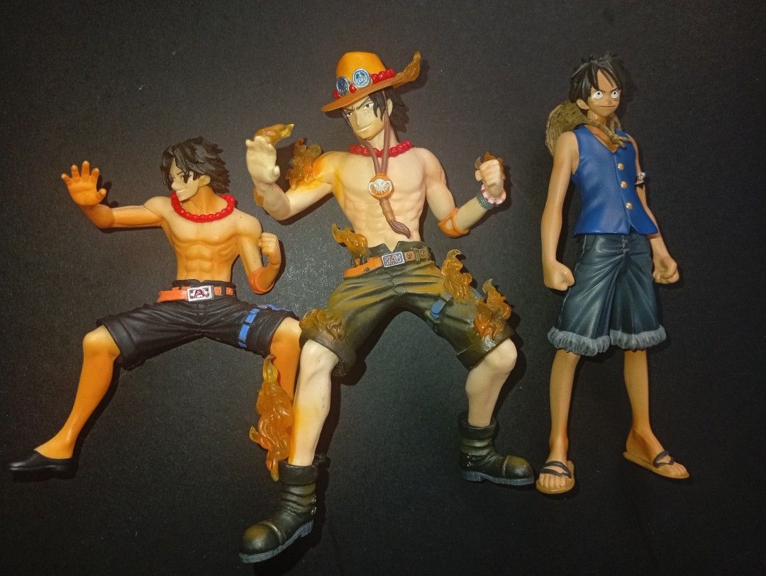 One piece figures set/bundle ( Monkey D. Luffy/Portgas D. Ace) (Category: Figurines & Statues) located in Tarlac. Submitted by kaizer_rabbit (Listing ID 1465795060, Image 1). Description: One piece figures set/bundle 🔥🔥🔥 Authentic and original from Japan 🇯🇵 produced by Banpresto/Bandai Monkey D. Luffy (Left): One Piece High Spec Coloring Figure 3 (HSCF 09) Portgas D. Ace (Top): Battle Record Collection - Portgas D. AAc Portgas D. Ace with Fl