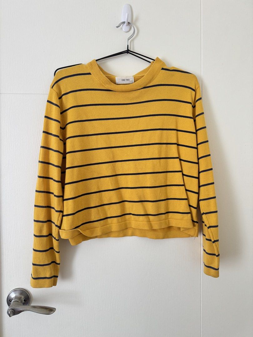 ONE TWO Striped Long Sleeve Sweater Yellow Black (Category: Longsleeves) located in Mandaluyong City. Submitted by trinket.ph (Listing ID 1466774969, Image 1). Description: - Thrifted -Brand: ONE TWO - Style: Yellow knit sweater with dark navy/black horizontal stripes and a cropped fit - Details: Round ribbed neckline and long sleeves - Condition: Excellent, clean fabric with no stains or pulls - Perfect for: Easy daily styling with high-waisted 