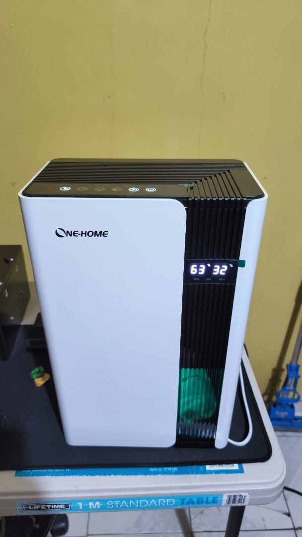 One-Home Dehumidifier with Digital Display (Category: Air Purifiers & Dehumidifiers) located in Bulacan. Submitted by live_bendee (Listing ID 1466876660, Image 1). Description: - Brand/Model: One-Home 2 in 1 Dehumidifier/Purifier - Smart Display: Real-time digital display for humidity percentage and temperature - Easy Control: Convenient touch control panel on top - Visible Tank: Transparent dark grey water tank so you know when to empty - Compac