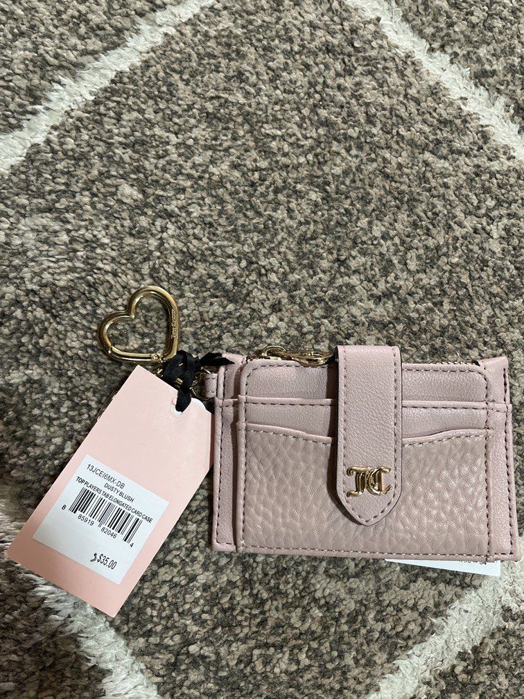 Original juicy couture wallet from U.S (Category: Wallets & Card holders) located in Manila. Submitted by ty_imported_goods (Listing ID 1466795555, Image 1). Description: Original from U.S Color:Dusty blush Srp: $35.