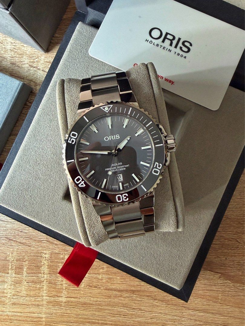 Oris Aquis Titanium Date (2024) Grey Dial (Category: Men's Watches) located in Pasig City. Submitted by migspaggabao (Listing ID 1466938375, Image 2). Description: Oris Aquis Titanium Date Grey Sunray Brushed Dial Ref. No. 01 733 7730 7153-07 8 24 15PEB Oris Calibre 733 38 Hours Power Reserve 43.5 mm case 9.7/10 condition. Mint! Dated yr 2024. Local AD purchase. Below SRP USD 2,750 (PHP 172.7k) Inclusions: watch, double box, manual, guarantee car