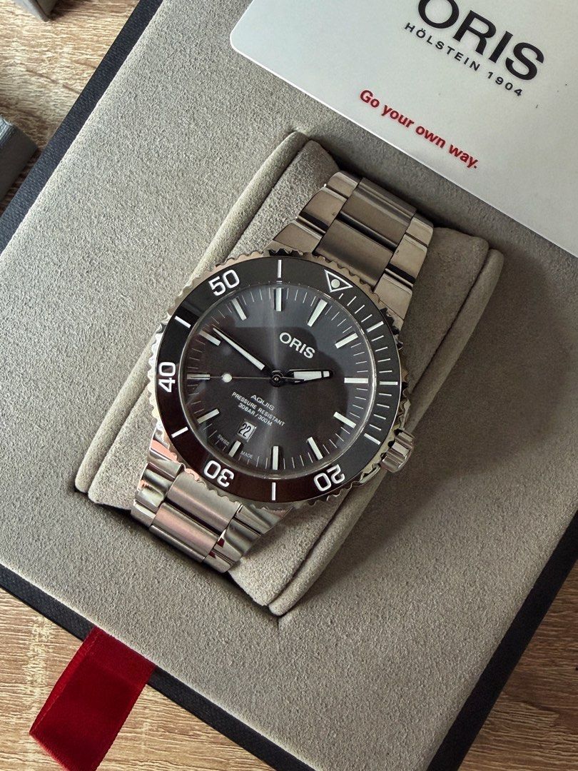 Oris Aquis Titanium Date (2024) Grey Dial (Category: Men's Watches) located in Pasig City. Submitted by migspaggabao (Listing ID 1466938375, Image 1). Description: Oris Aquis Titanium Date Grey Sunray Brushed Dial Ref. No. 01 733 7730 7153-07 8 24 15PEB Oris Calibre 733 38 Hours Power Reserve 43.5 mm case 9.7/10 condition. Mint! Dated yr 2024. Local AD purchase. Below SRP USD 2,750 (PHP 172.7k) Inclusions: watch, double box, manual, guarantee car