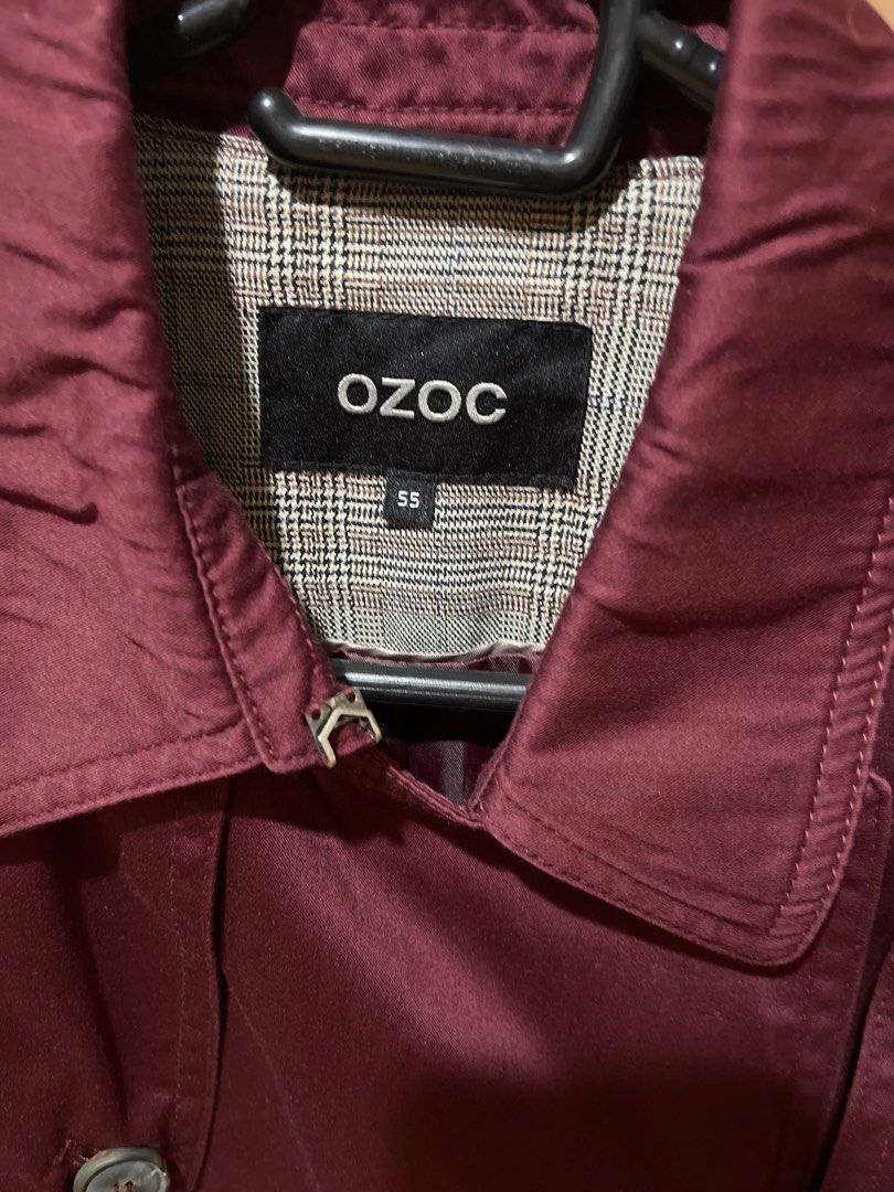 OZOC Maroon Double-Breasted Trench Coat Size 55 (Category: Coats, Jackets and Outerwear) located in Quezon City. Submitted by donnabelle7572 (Listing ID 1466887348, Image 3). Description: - Brand: OZOC - Size: 55 - Color: Rich maroon / deep burgundy wine - Style: Double-breasted trench coat with classic fit - Features: Matching belt, shoulder epaulets, storm flap, and two side pockets - Details: Chic plaid lining inside collar and upper back, plu