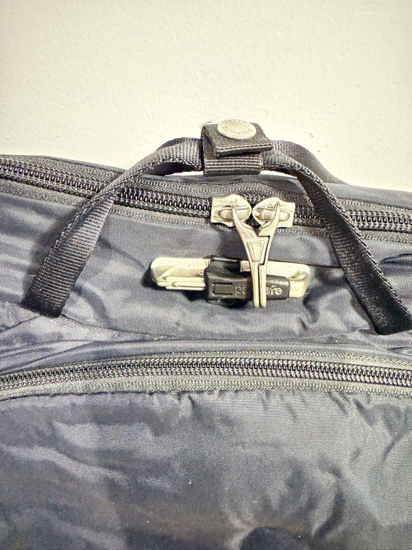 Pacsafe Vibe Anti-Theft Backpack Black (Category: Backpacks) located in Quezon City. Submitted by shaberbree (Listing ID 1466910432, Image 2). Description: - Brand: Pacsafe Vibe - Color: Classic Black - Security: Anti-theft lock system on zippers & RFID-safe pocket - Compartments: Padded tablet sleeve with velcro strap & zippered inner compartment - Extras: Multiple organizer slots & stylish map print interior lining - Condition: Clean fabric ins