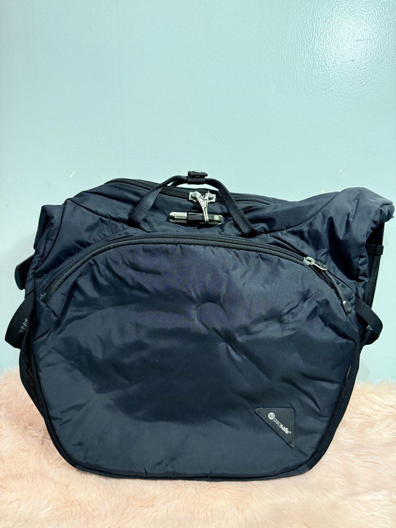 Pacsafe Vibe Anti-Theft Backpack Black (Category: Backpacks) located in Quezon City. Submitted by shaberbree (Listing ID 1466910432, Image 1). Description: - Brand: Pacsafe Vibe - Color: Classic Black - Security: Anti-theft lock system on zippers & RFID-safe pocket - Compartments: Padded tablet sleeve with velcro strap & zippered inner compartment - Extras: Multiple organizer slots & stylish map print interior lining - Condition: Clean fabric ins