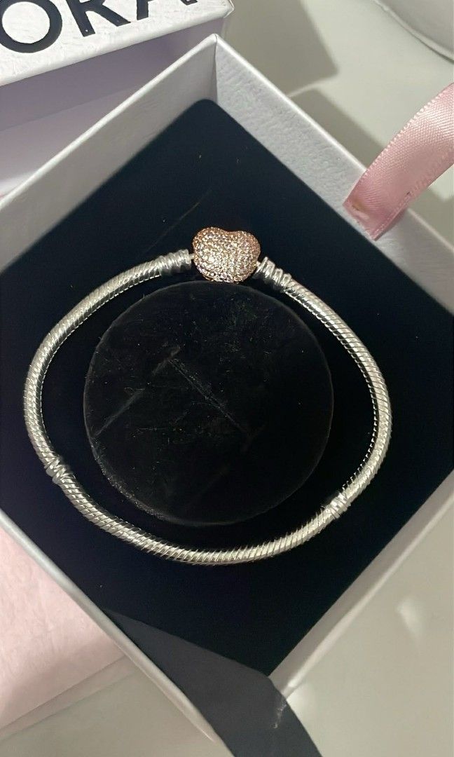 Pandora Two tone pave heart clasp bracelet (Category: Bracelets) located in Manila. Submitted by mycloset2025 (Listing ID 1466940613, Image 1). Description: .