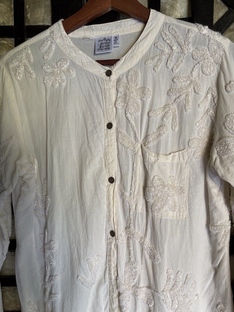 Parsley & Sage Embroidered Button-Down Blouse Size M (Category: Blouses) located in Batangas. Submitted by purple_and_orange (Listing ID 1466828994, Image 2). Description: - Brand: Parsley & Sage - Size: Medium (Made in India) - Material: 100% Cotton - Color: Off-white with beautiful tonal floral and vine embroidery - Features: Mandarin collar, front button closure, single chest pocket, and long sleeves - Care: Hand wash recommended - Condition: 