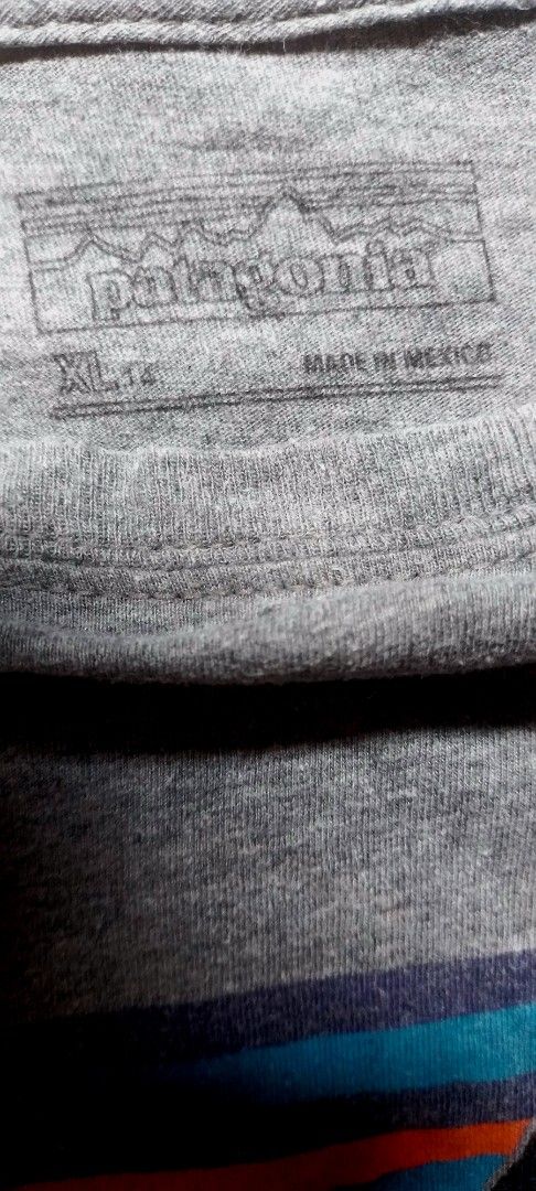 Patagonia (17 x 24) (Category: Coats, Jackets and Outerwear) located in Cagayan de Oro. Submitted by jublamerba95478 (Listing ID 1466812774, Image 3). Description: Patagonia long sleeve tee in grey. Classic mountain range logo printed across the chest. Made from 100 percent organic cotton. Tagged size XL 14, Dimension (17 x 24 ) manufactured in Mexico. Comfortable everyday shirt. Wash wear present from regular use..