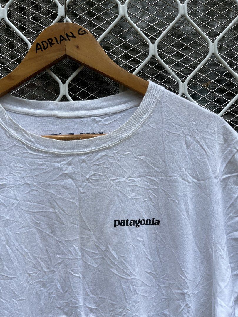 Patagonia White Responsibili-Tee with Back Logo (Category: Tshirts & Polo Shirts ) located in Panaon. Submitted by adrian_galope. (Listing ID 1466796778, Image 3). Description: - Brand: Patagonia - Item: Responsibili-Tee - Color: White - Fit: Standard fit, short sleeves, crew neck - Details: Small logo on chest, large mountain graphic on the back - Material: 100% organic cotton - Origin: Made in Mexico - Condition: Brand new with interior tags at
