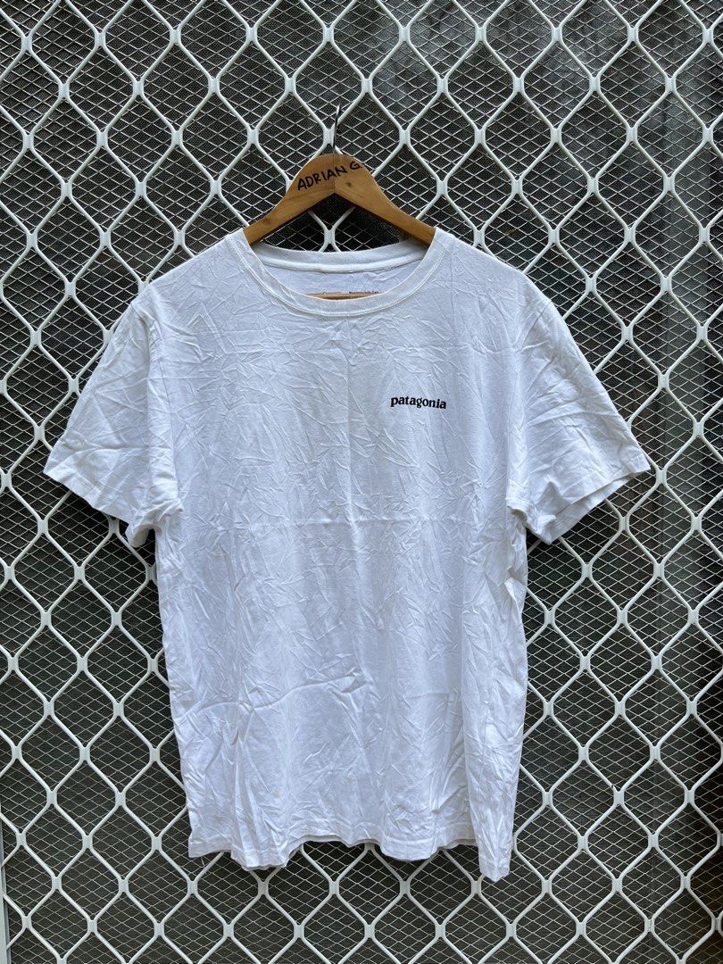 Patagonia White Responsibili-Tee with Back Logo (Category: Tshirts & Polo Shirts ) located in Panaon. Submitted by adrian_galope. (Listing ID 1466796778, Image 1). Description: - Brand: Patagonia - Item: Responsibili-Tee - Color: White - Fit: Standard fit, short sleeves, crew neck - Details: Small logo on chest, large mountain graphic on the back - Material: 100% organic cotton - Origin: Made in Mexico - Condition: Brand new with interior tags at