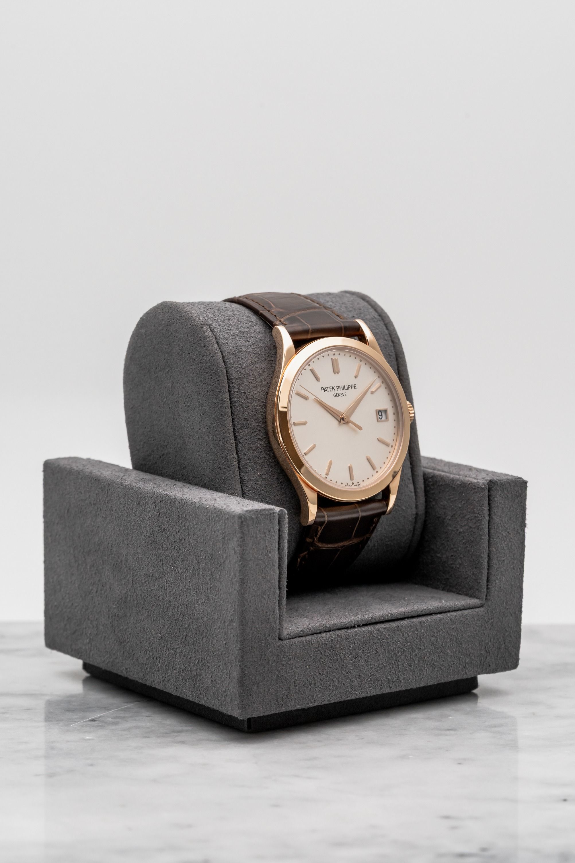 Patek Philippe Calatrava Date 5296R-010 Silver Dial • 2020 • 📦 & 📄 (Category: Watches) located in Singapore. Submitted by timetells (Listing ID 1466793731, Image 3). Description: Brand: Patek Philippe Model: Calatrava Date Reference Number: 5296R-010 Year: 2020 Case Size: 38 mm Case Material: 18K Rose Gold Dial: Silvered Dial with Applied 18K Rose Gold Baton Hour Markers, Dauphine Hands, Central Seconds, Beaded Minute Track, and Date Window at 
