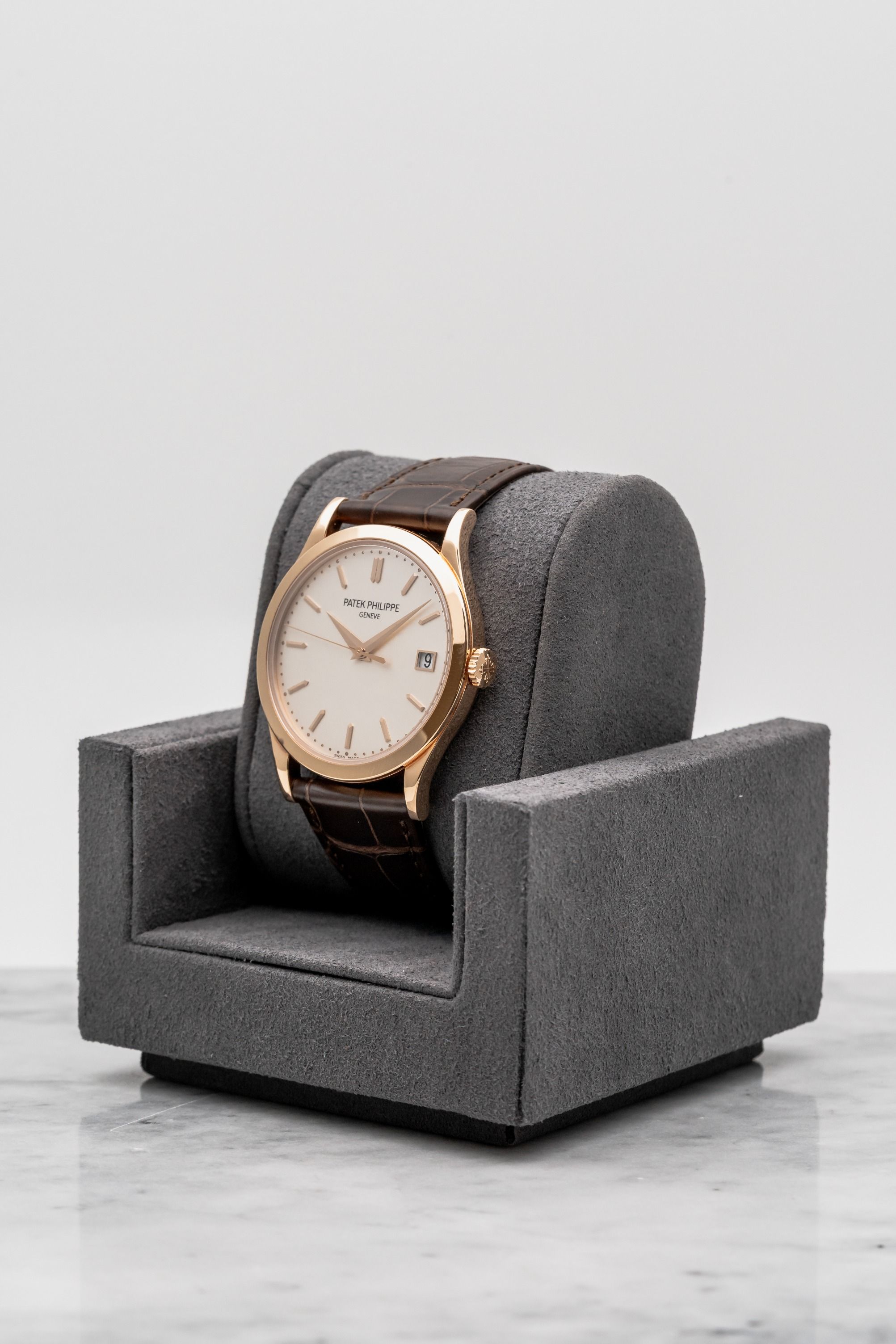 Patek Philippe Calatrava Date 5296R-010 Silver Dial • 2020 • 📦 & 📄 (Category: Watches) located in Singapore. Submitted by timetells (Listing ID 1466793731, Image 2). Description: Brand: Patek Philippe Model: Calatrava Date Reference Number: 5296R-010 Year: 2020 Case Size: 38 mm Case Material: 18K Rose Gold Dial: Silvered Dial with Applied 18K Rose Gold Baton Hour Markers, Dauphine Hands, Central Seconds, Beaded Minute Track, and Date Window at 