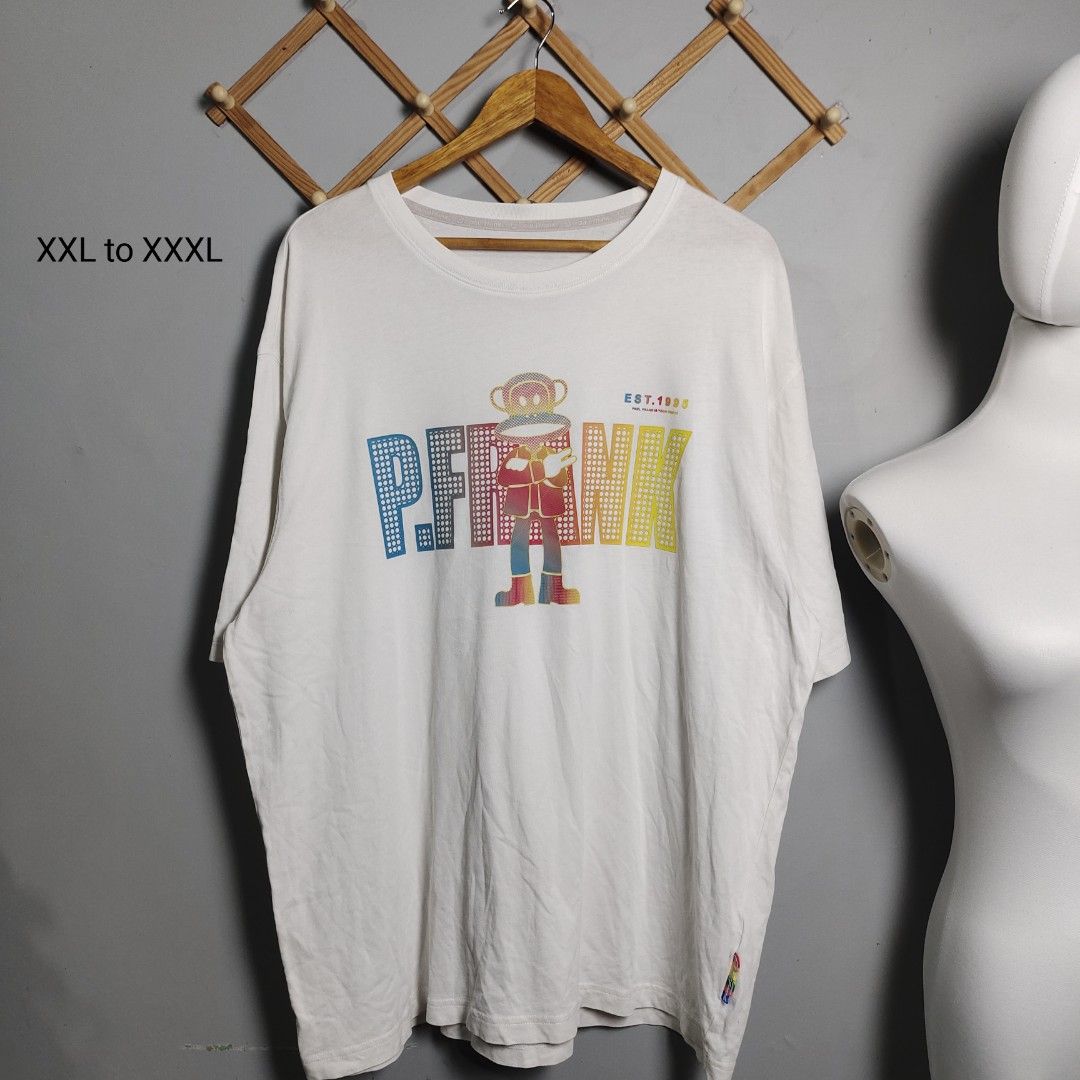 Paul Frank Graphic Tee (Category: Tshirts & Polo Shirts ) located in Tayabas. Submitted by lorrena (Listing ID 1466963013, Image 1). Description: - Size: Oversized fit (Best fits XXL to XXXL) - Color: White with colorful front graphic print - Details: Clean Paul Frank red and navy back print, plus a signature rainbow side seam tag - Material: Comfortable, breathable cotton - Style: Relaxed streetwear.