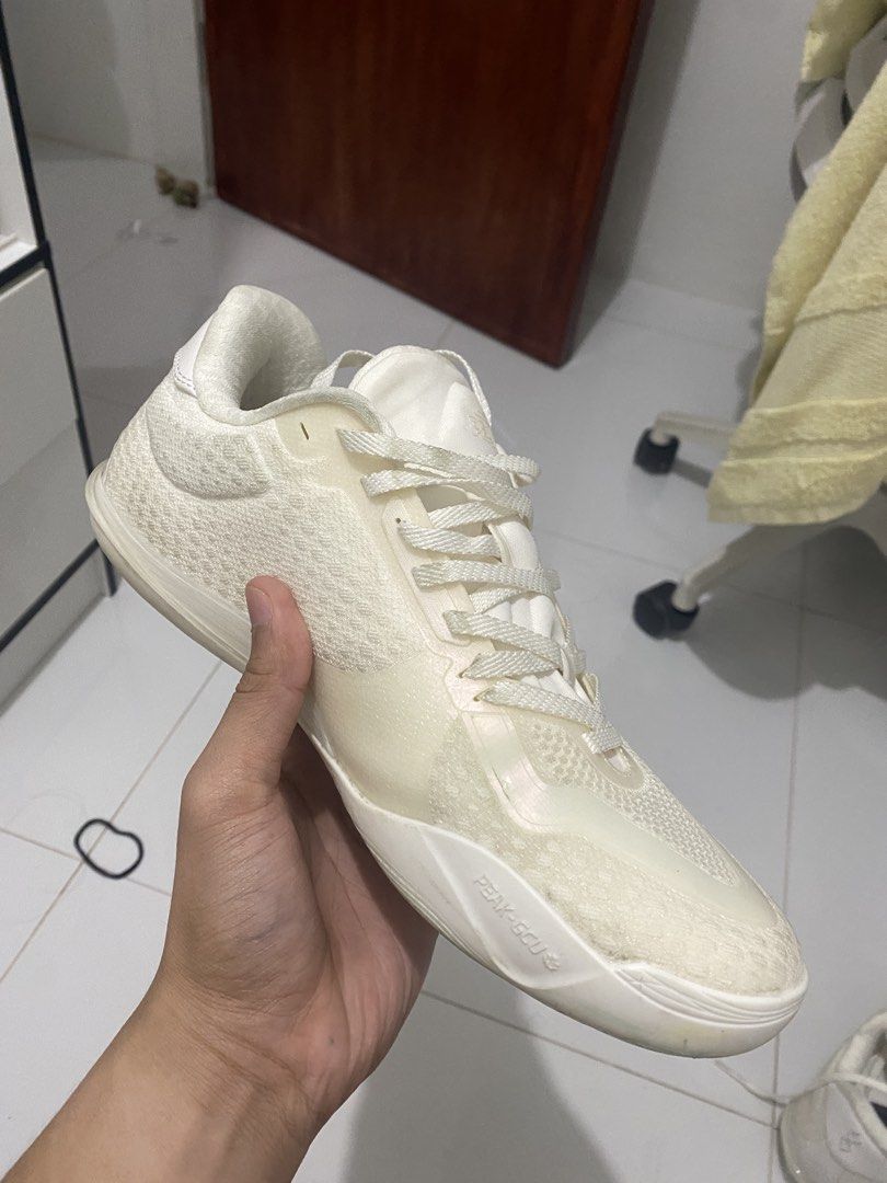 Peak taichi supreme low v2 all white (Category: Activewear) located in Binan City. Submitted by couchpotatocla (Listing ID 1466907353, Image 1). Description: - Brand: Peak - Colorway: All-White - Material: Knit upper with supportive synthetic overlays - Closure: Standard lace-up - Details: Branded triangular logo on the side panel - Condition: Clean overall - Inclusions: Original purchase receipt included (dated October 2026).