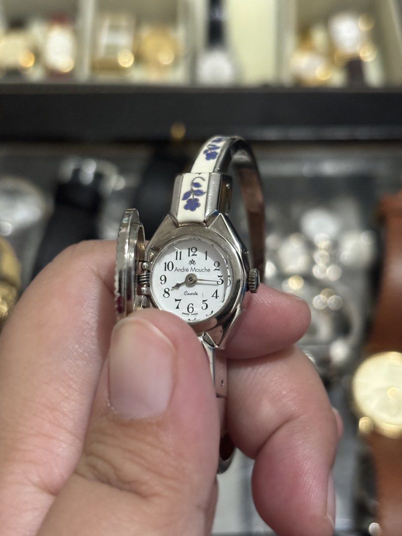 André Mouche Peekaboo Watches (Category: Women's Watches) located in Manila. Submitted by timelesswatchbyclaaa2.0 (Listing ID 1466897239, Image 3). Description: (SOLD)Itraco Swiss Peekaboo Watch 4000 André Mouche White Peekaboo Watch 4500 André Mouche Triple White Rose with orig box inclusion 6800.