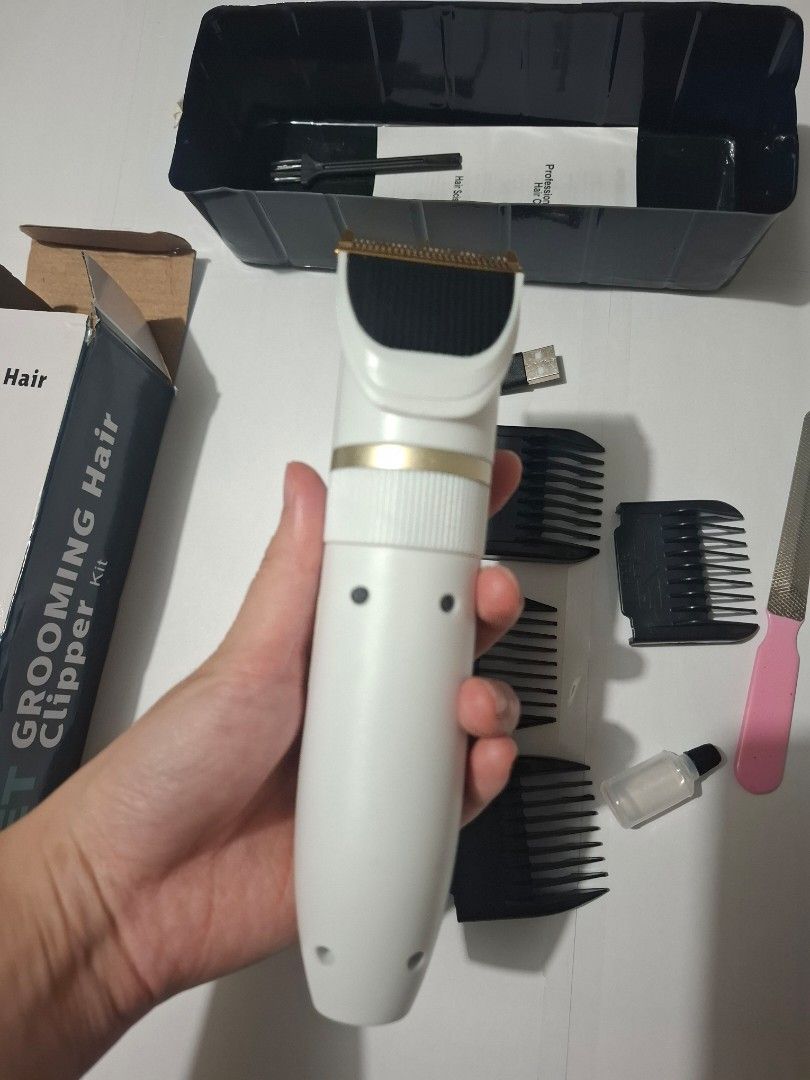 Pet trimmer set (Category: Homes & Other Pet Accessories) located in Quezon City. Submitted by the-find (Listing ID 1466965873, Image 3). Description: gifted ro me. Used once. Reason for selling is I have two..