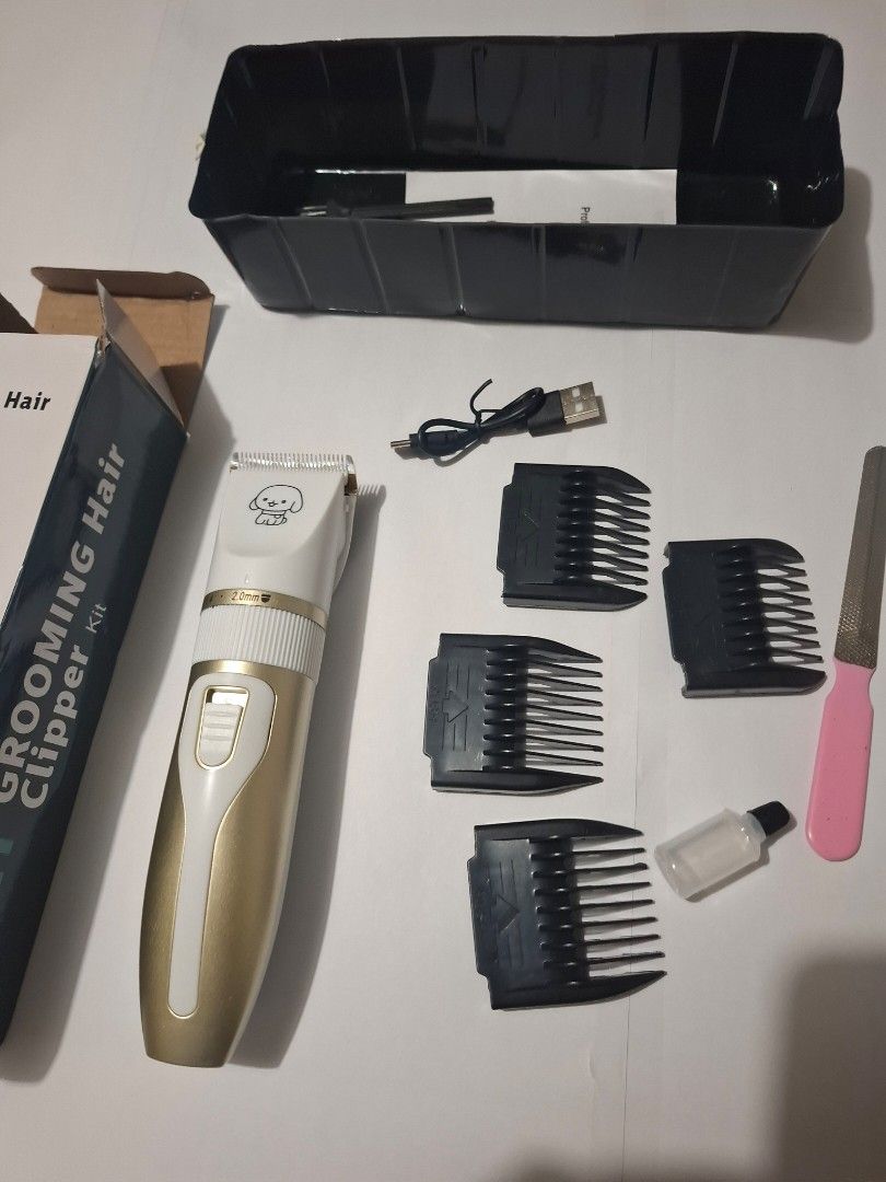 Pet trimmer set (Category: Homes & Other Pet Accessories) located in Quezon City. Submitted by the-find (Listing ID 1466965873, Image 2). Description: gifted ro me. Used once. Reason for selling is I have two..
