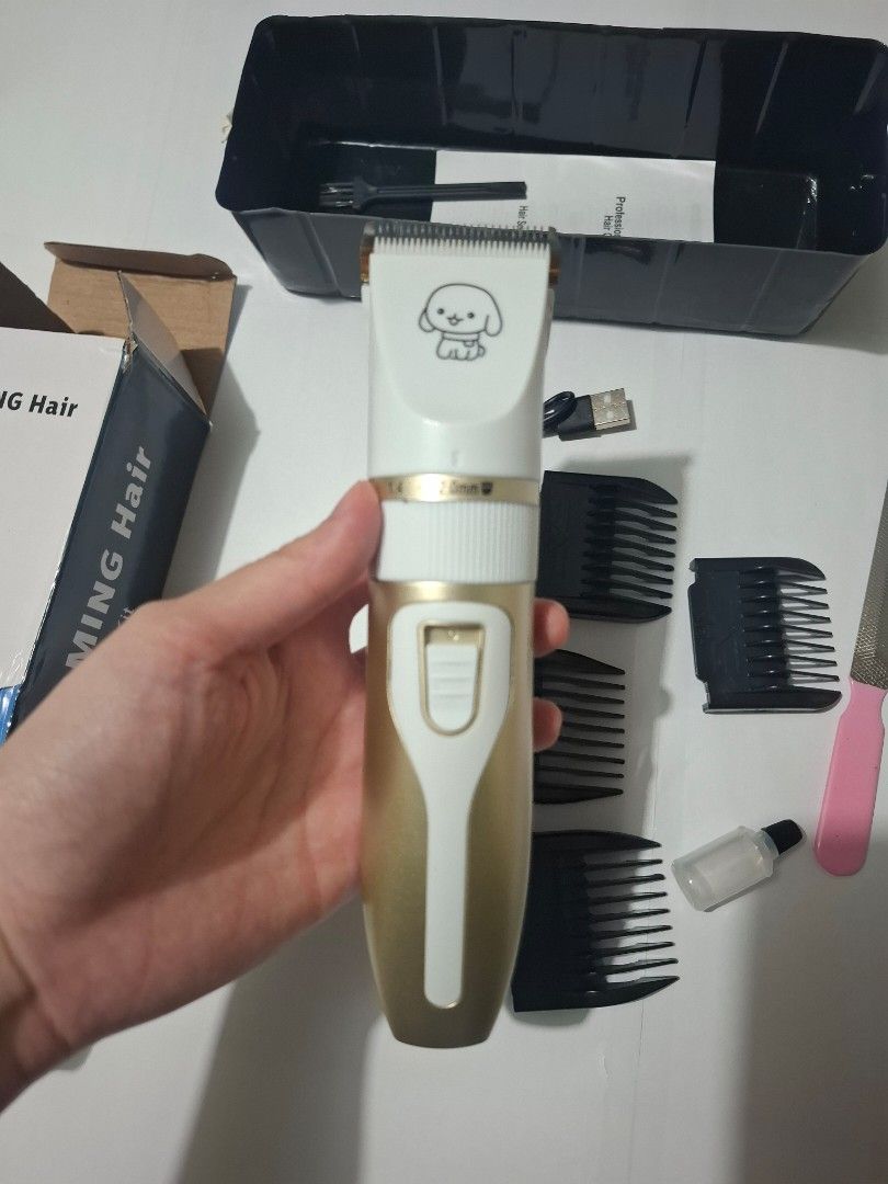Pet trimmer set (Category: Homes & Other Pet Accessories) located in Quezon City. Submitted by the-find (Listing ID 1466965873, Image 1). Description: gifted ro me. Used once. Reason for selling is I have two..