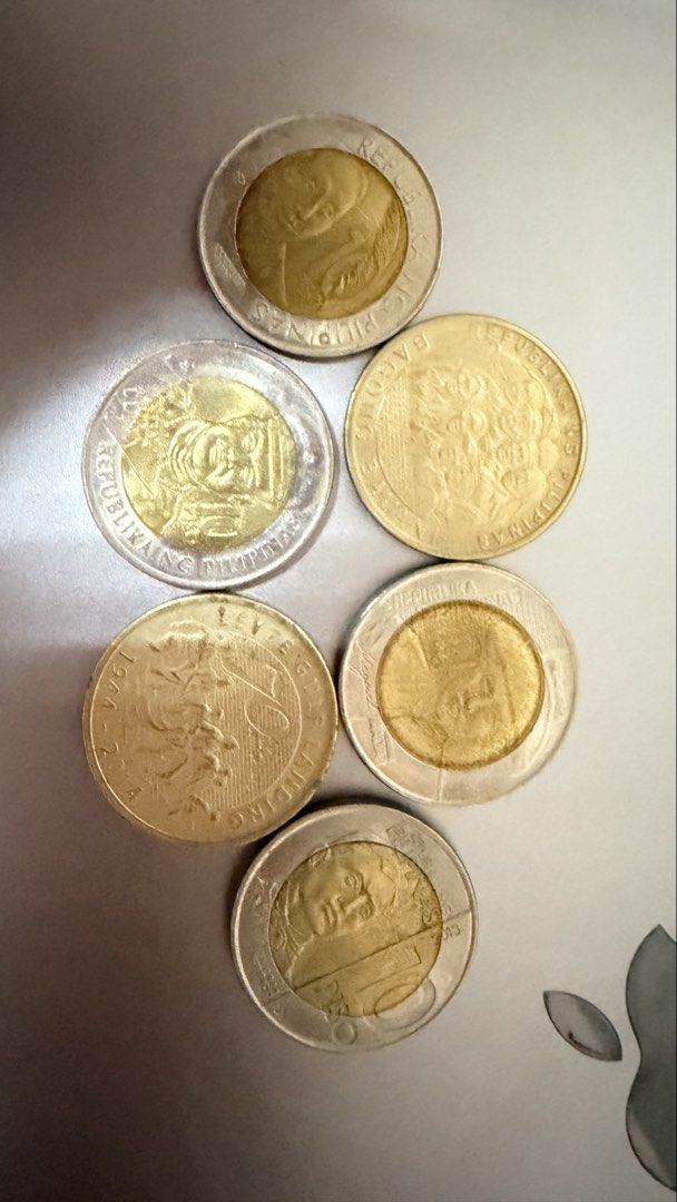 Philippine Commemorative and Circulation Coins Collection (Category: Currency) located in Makati City. Submitted by thriftdahanol (Listing ID 1466803790, Image 2). Description: - Lot of various Philippine coins for sale - Includes 1 Piso, 5 Piso, and commemorative issues (Leyte Landing, Marcelo H. Del Pilar) - Features bi-metal and silver-tone finishes with mixed dates - Ideal for numismatic hobbyists and local currency collectors - Selling as a 