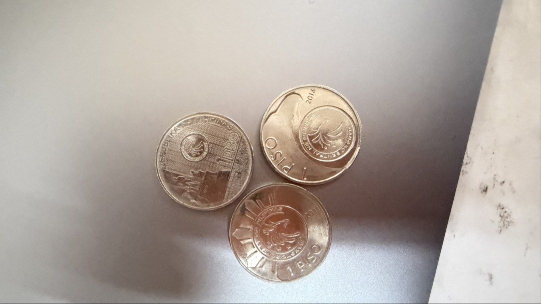 Philippine Commemorative and Circulation Coins Collection (Category: Currency) located in Makati City. Submitted by thriftdahanol (Listing ID 1466803790, Image 3). Description: - Lot of various Philippine coins for sale - Includes 1 Piso, 5 Piso, and commemorative issues (Leyte Landing, Marcelo H. Del Pilar) - Features bi-metal and silver-tone finishes with mixed dates - Ideal for numismatic hobbyists and local currency collectors - Selling as a 