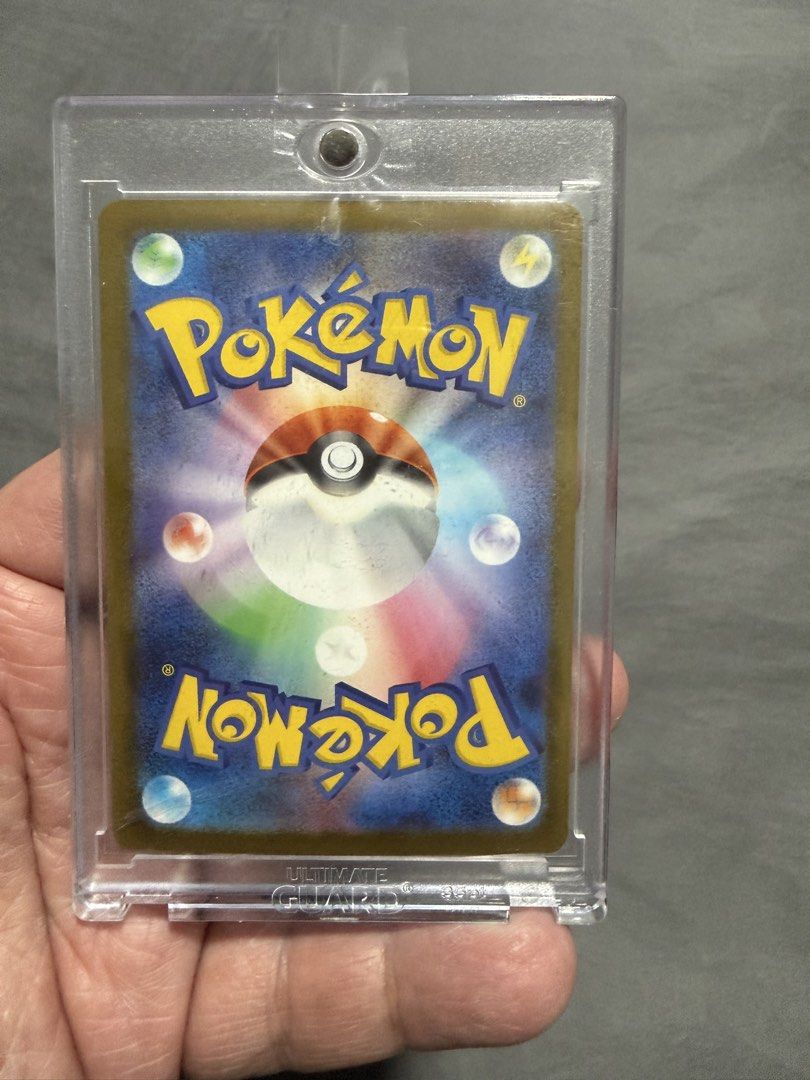 Pikachu (Category: Raw Cards) located in Singapore. Submitted by alvinwee77 (Listing ID 1466967708, Image 2). Description: - Card: Japanese Pikachu ex Special Art Rare (234/193, m2a set) - Artwork: Tera form with vibrant gems and crystals - Condition: Clean centering on both front and back - Protection: Includes an Ultimate Guard clear magnetic hard case - Ideal for: Serious collectors and Pokémon fans - very high chance to able PSA 10.
